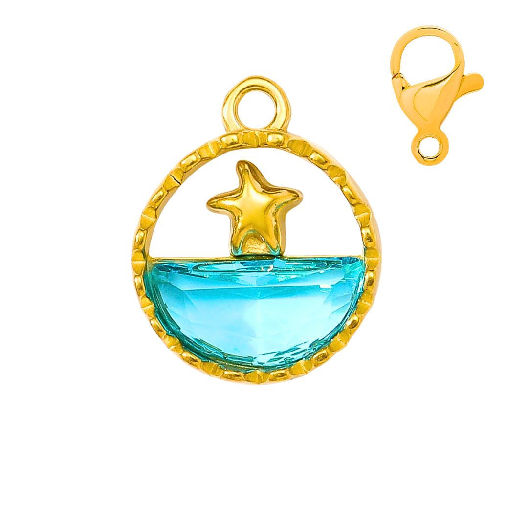 Minaz Charm Stella Mare aus Edelstahl in Gold mit blauem Zirkonia und Seestern Detail