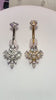 Minaz Bauchnabelpiercing Sienna Titan in Gold und Silber, Produktvideo mit floralem Zirkonia